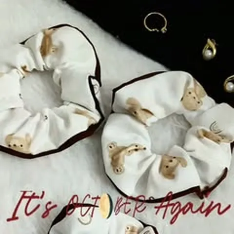 White teddy print scrunchies with brown trim